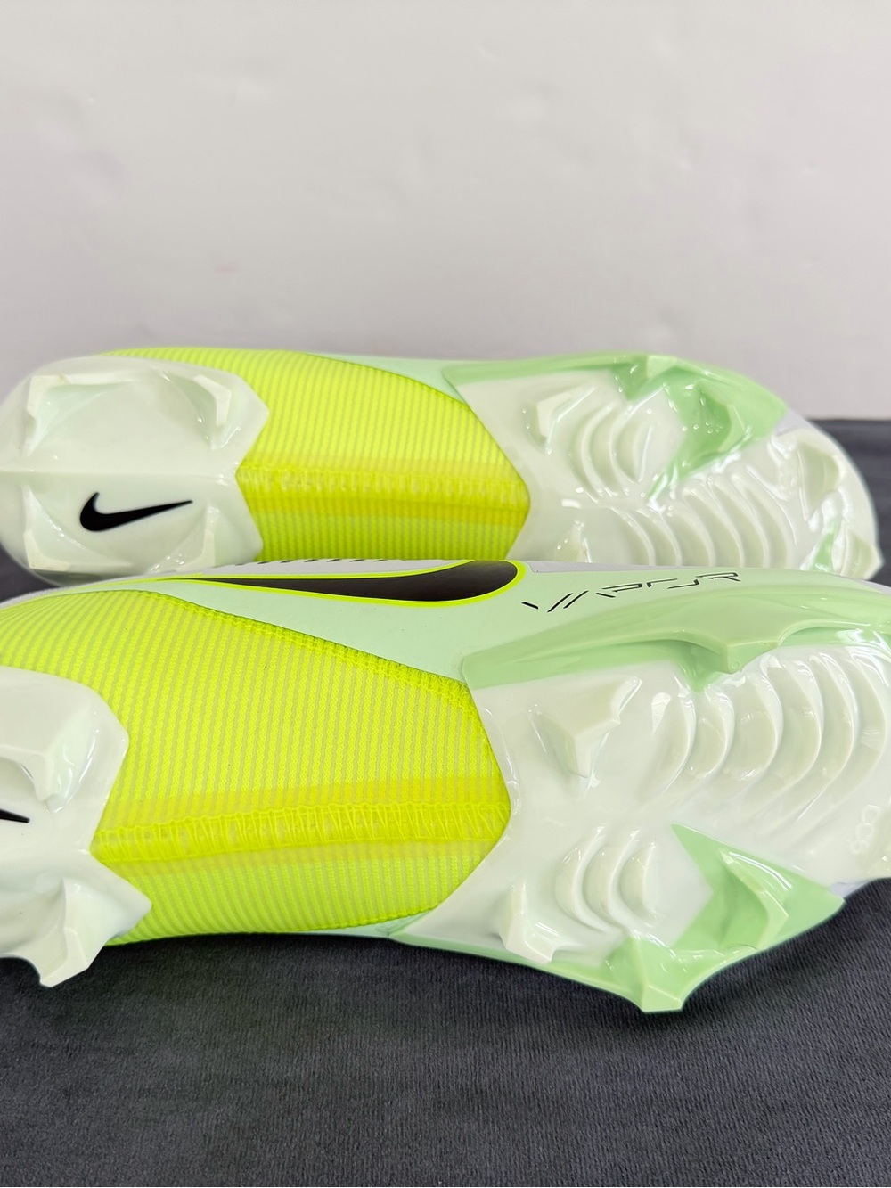 Nike Men’s White Athletic Cleats with Neon Yellow Accents - Picture 9 of 10